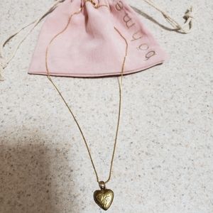 Urban Outfitters gold heart locket necklace